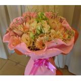 鲜花:粉色香水百合2支，绿叶，手柔纸包装 （特价鲜花，只送市区一级）